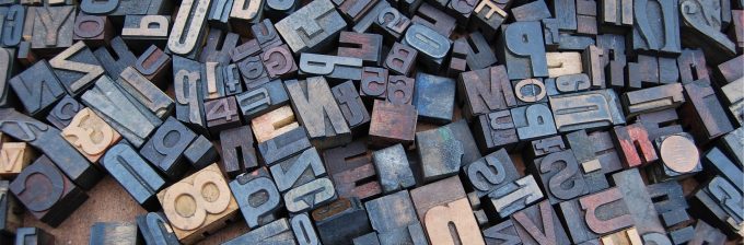 A close-up of typesetting blocks - how writing used to end up on the page.